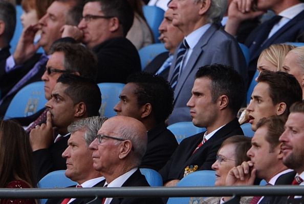 Robin van Persie of Manchester United looks on from the stands prior to during the Barclays Premier League match between Manchester City and Manchester United at the Etihad Stadium on September 22, 2013 in Manchester, England. (Getty Images)